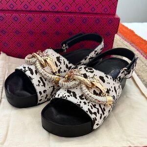 Elegant Black and White Sandals with Gold Detailing